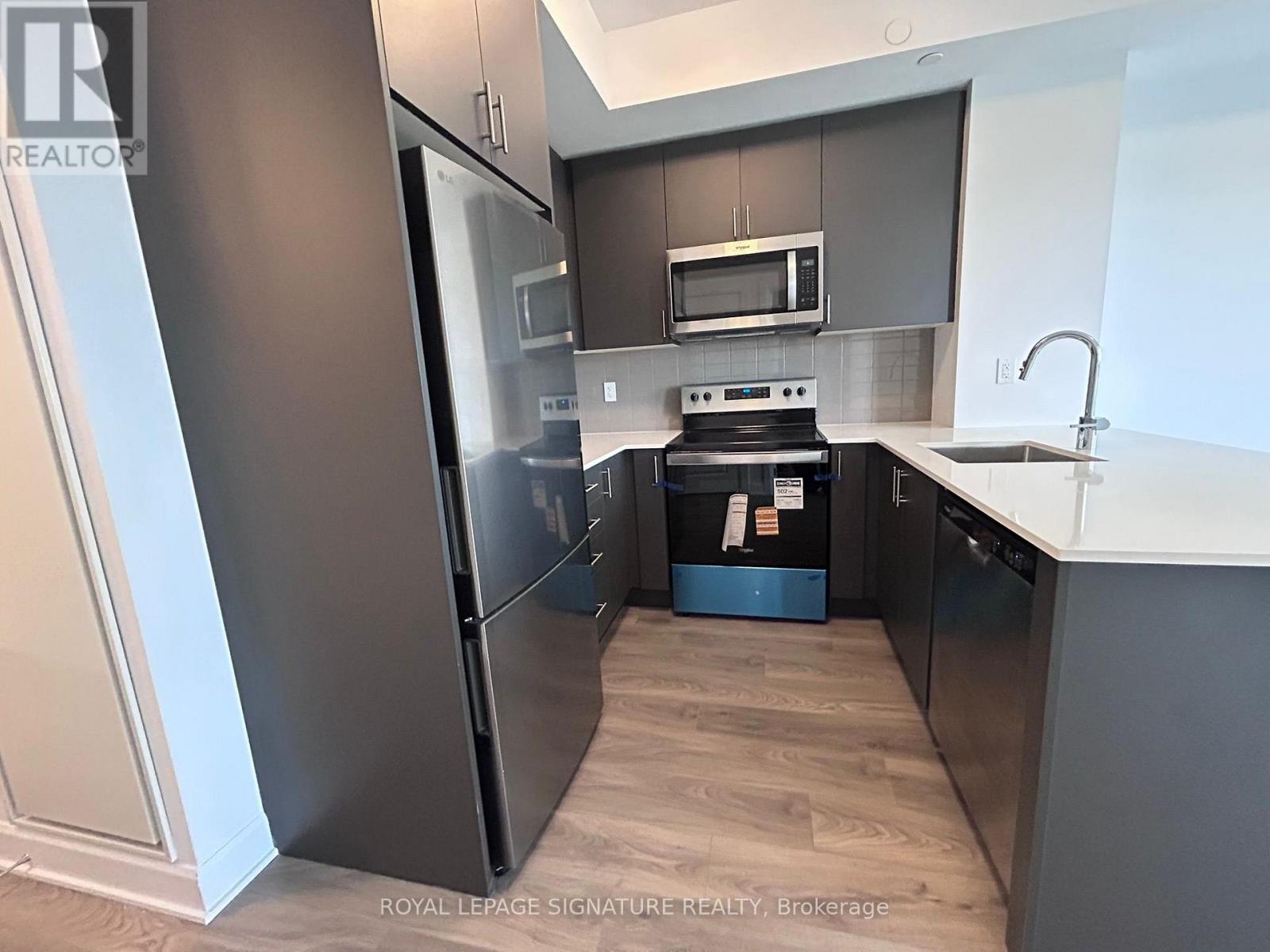 1506 - 3240 William Coltson Avenue, Oakville, Ontario  L6H 8C8 - Photo 6 - W12610268