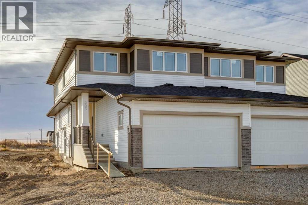 303 Dawson Dock Way, Chestermere, Alberta T1X 2X2 - Photo 1 - A2268612