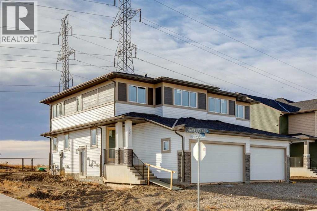 303 Dawson Dock Way, Chestermere, Alberta T1X 2X2 - Photo 2 - A2268612