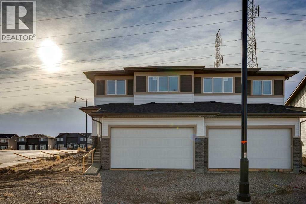 303 Dawson Dock Way, Chestermere, Alberta T1X 2X2 - Photo 3 - A2268612