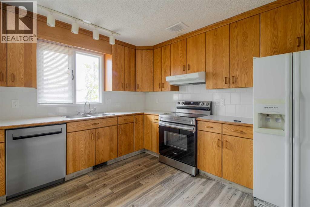 49 Simon Fraser Boulevard W, Lethbridge, Alberta  T1K 4R1 - Photo 10 - A2269360