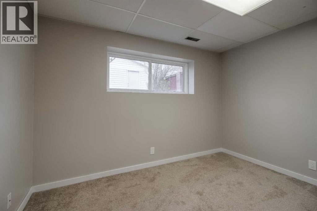 49 Simon Fraser Boulevard W, Lethbridge, Alberta  T1K 4R1 - Photo 32 - A2269360