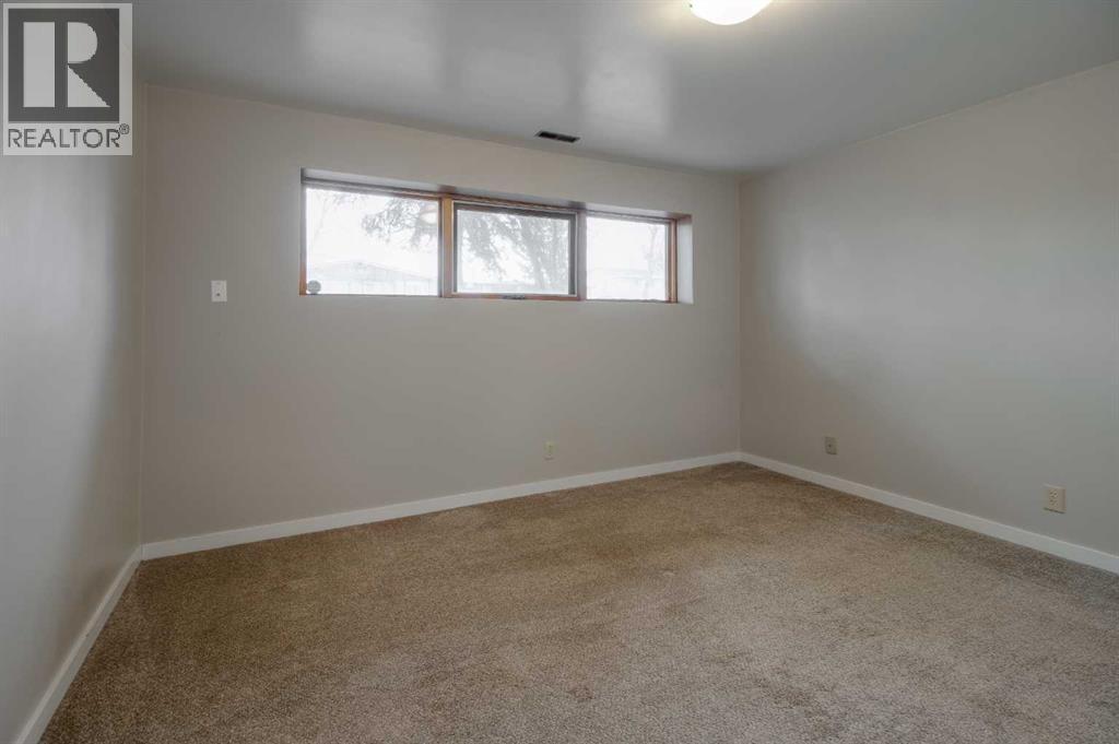 49 Simon Fraser Boulevard W, Lethbridge, Alberta  T1K 4R1 - Photo 30 - A2269360