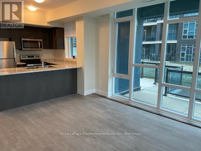 140 - 16 Concord Place, Grimsby, Ontario L3M 0J1 - Photo 2 - X12610746