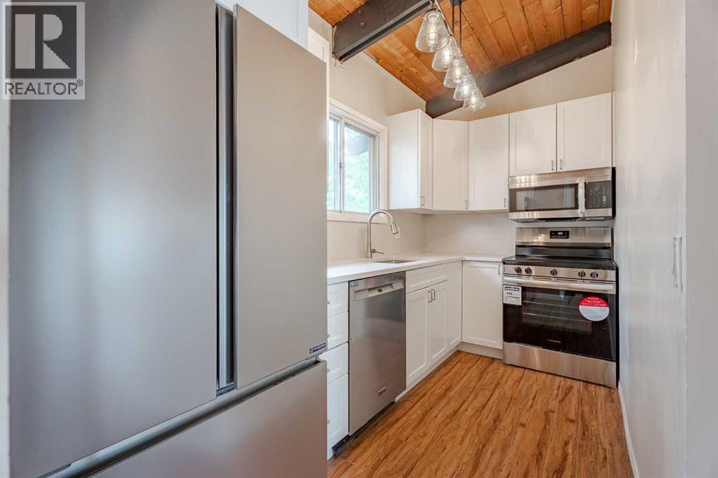 11016 5 Street Sw, Calgary, Alberta  T2W 1Y6 - Photo 5 - A2223643