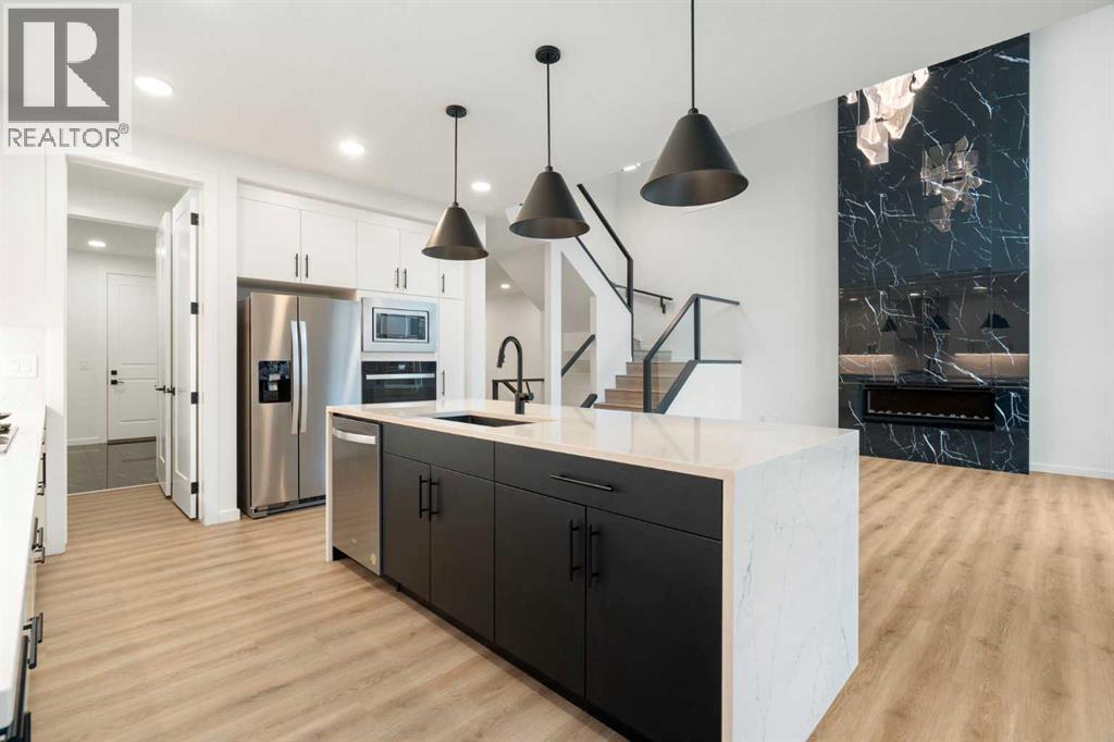 296 Spring Creek Circle Sw, Calgary, Alberta  T3H 6G4 - Photo 6 - A2239415