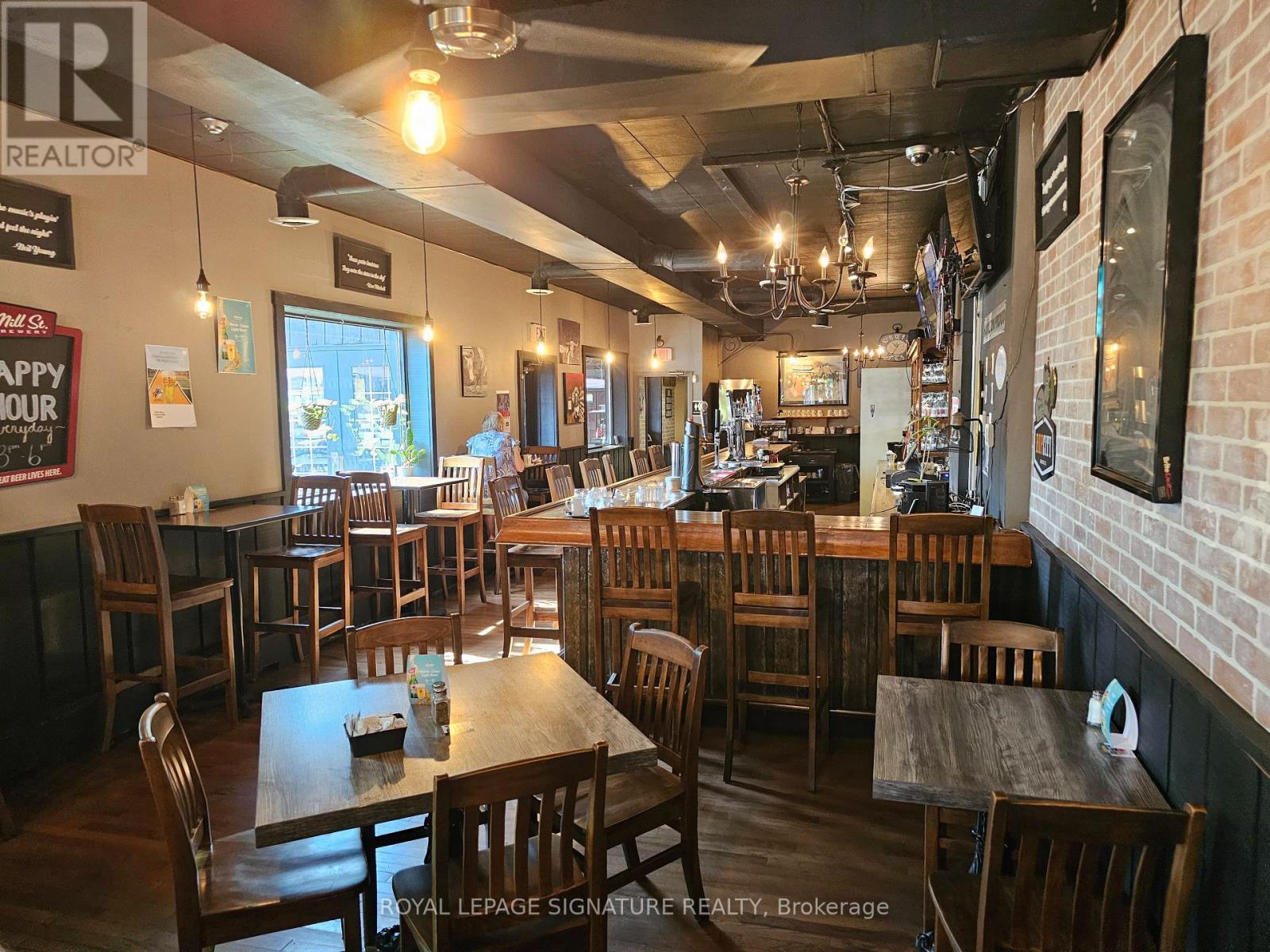 1342 Main Street E, Hamilton, Ontario  L8K 1B5 - Photo 3 - X12611032