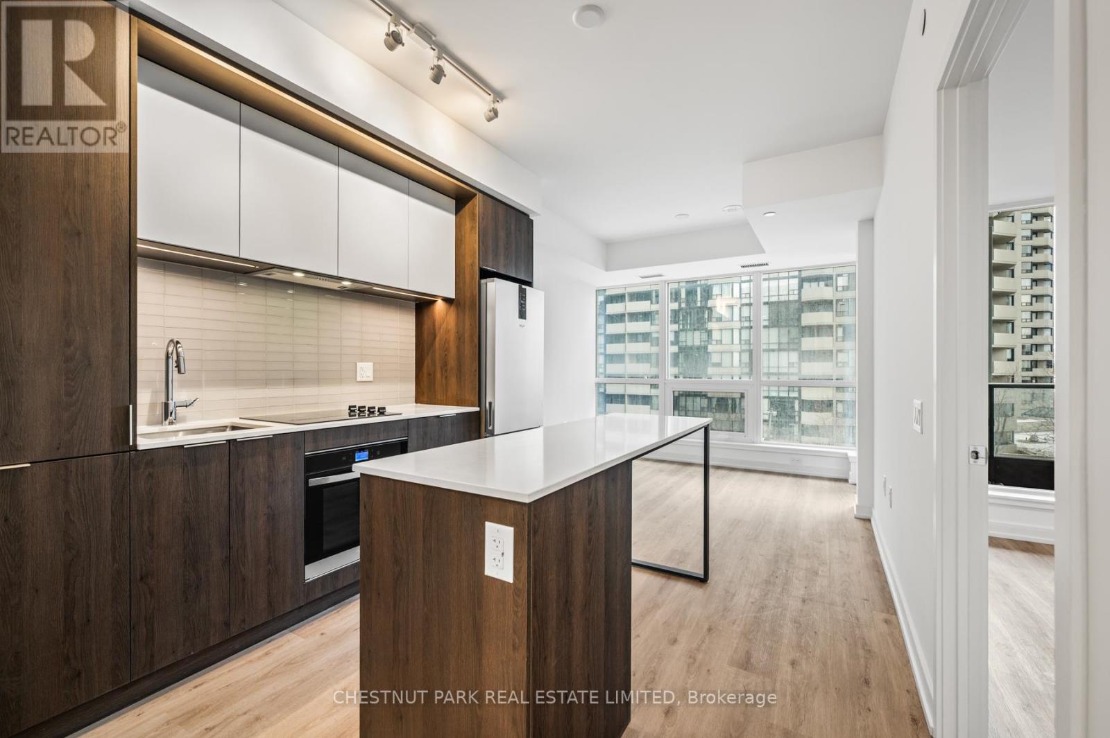 318 - 395 Square One Drive, Mississauga, Ontario  L5B 0P6 - Photo 3 - W12611356