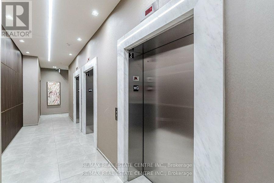 1308 - 395 Square One Drive, Mississauga, Ontario  L5B 0P6 - Photo 3 - W12611090