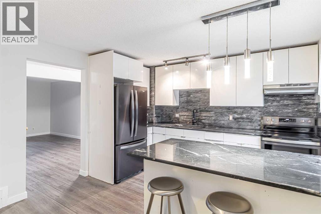 212 Georgian Villas Ne, Calgary, Alberta  t2a 7c9 - Photo 5 - A2265583