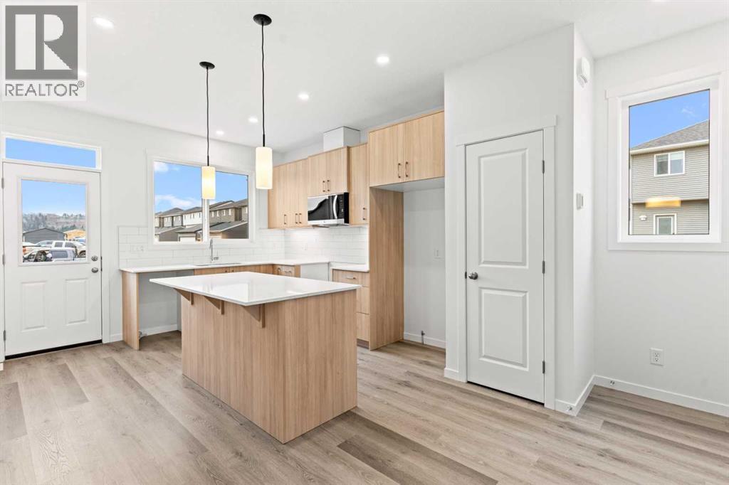 918 Creekside Boulevard Sw, Calgary, Alberta T2X 5G8 - Photo 10 - A2268874