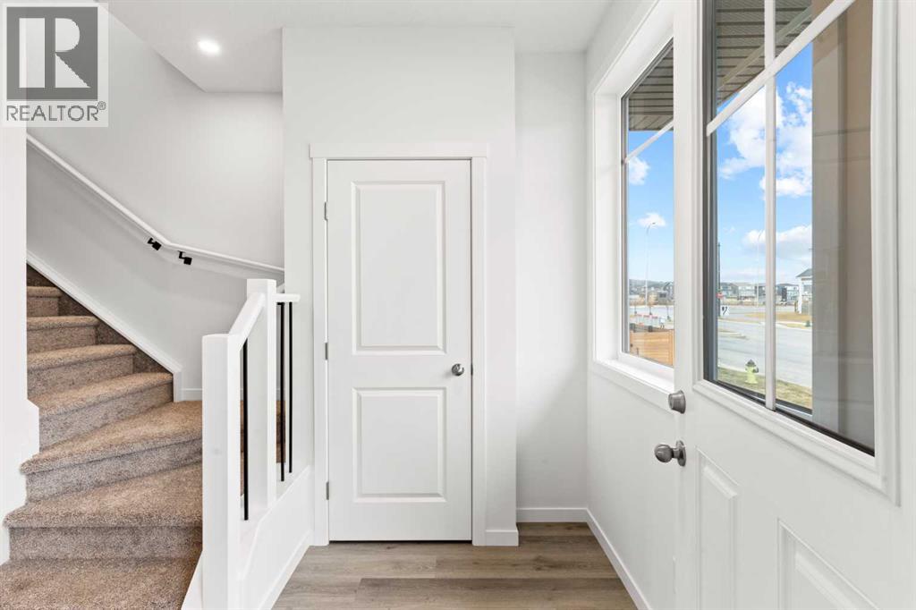 918 Creekside Boulevard Sw, Calgary, Alberta T2X 5G8 - Photo 3 - A2268874