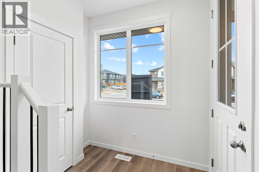 918 Creekside Boulevard Sw, Calgary, Alberta T2X 5G8 - Photo 4 - A2268874