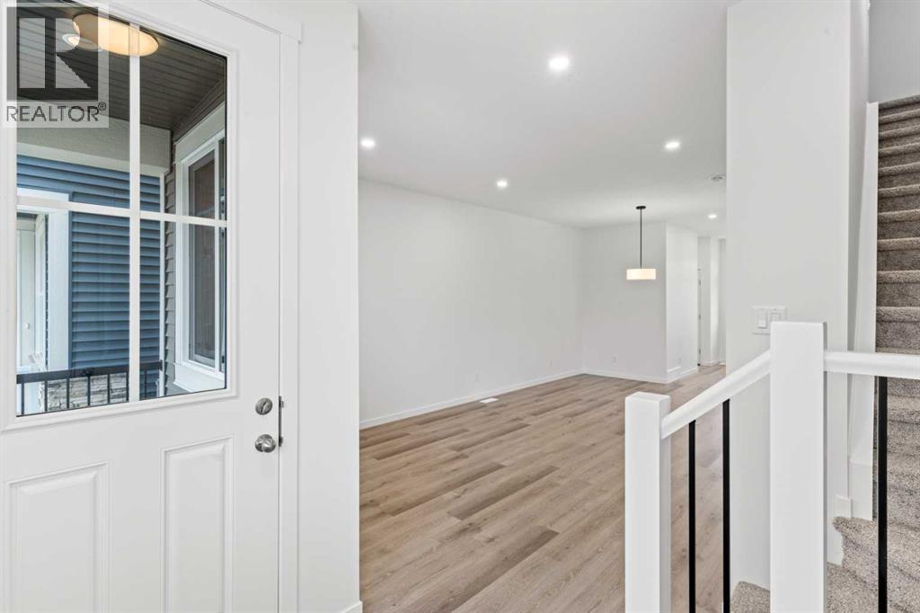 918 Creekside Boulevard Sw, Calgary, Alberta T2X 5G8 - Photo 2 - A2268874