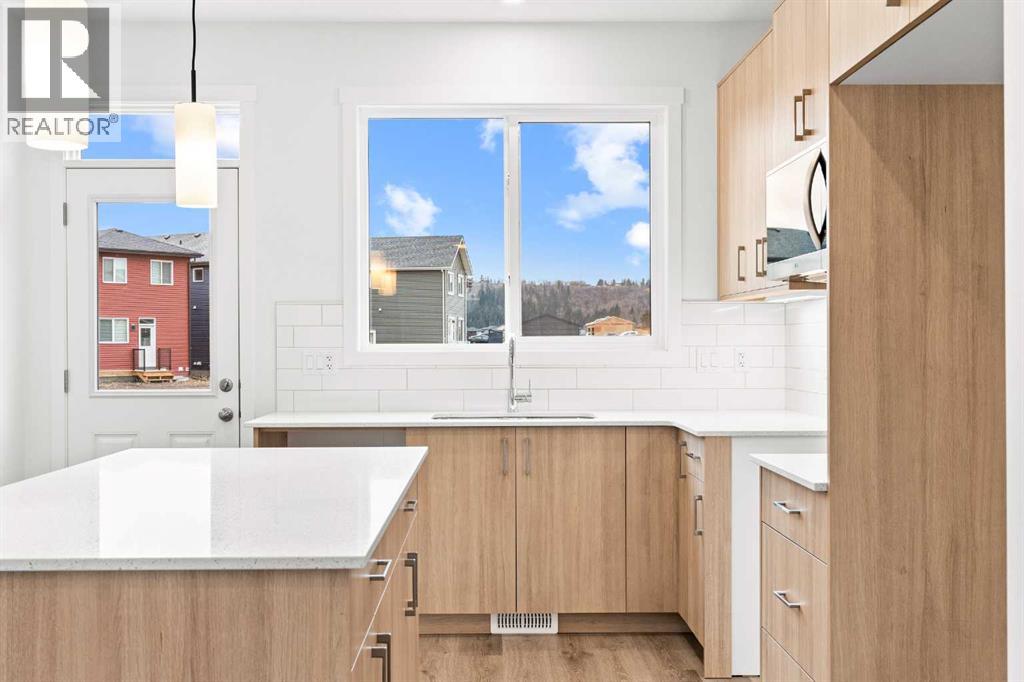 918 Creekside Boulevard Sw, Calgary, Alberta T2X 5G8 - Photo 11 - A2268874