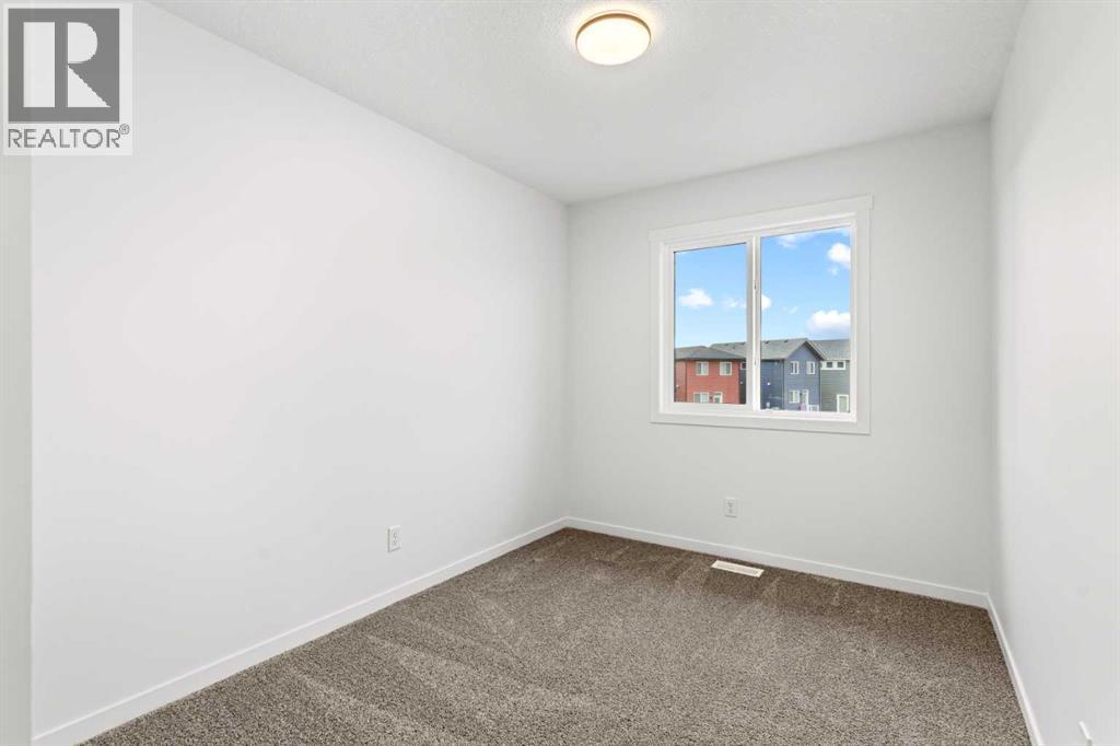 918 Creekside Boulevard Sw, Calgary, Alberta T2X 5G8 - Photo 16 - A2268874