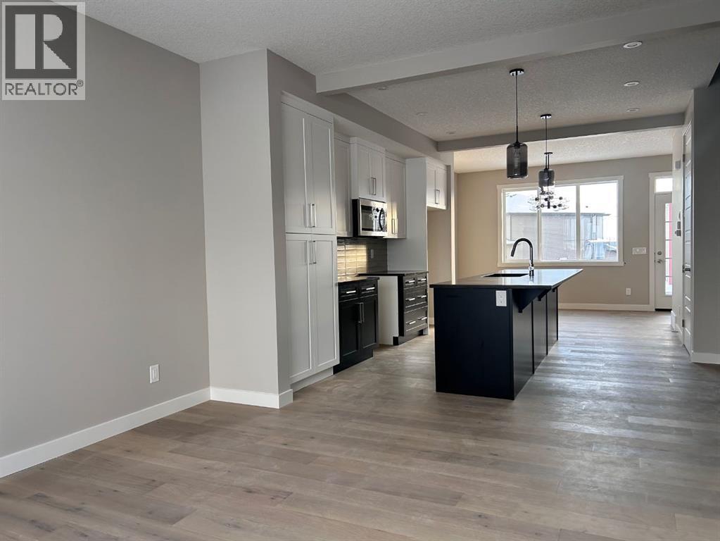 33 Sora Gate Se, Calgary, Alberta T3S 0A7 - Photo 4 - A2273033