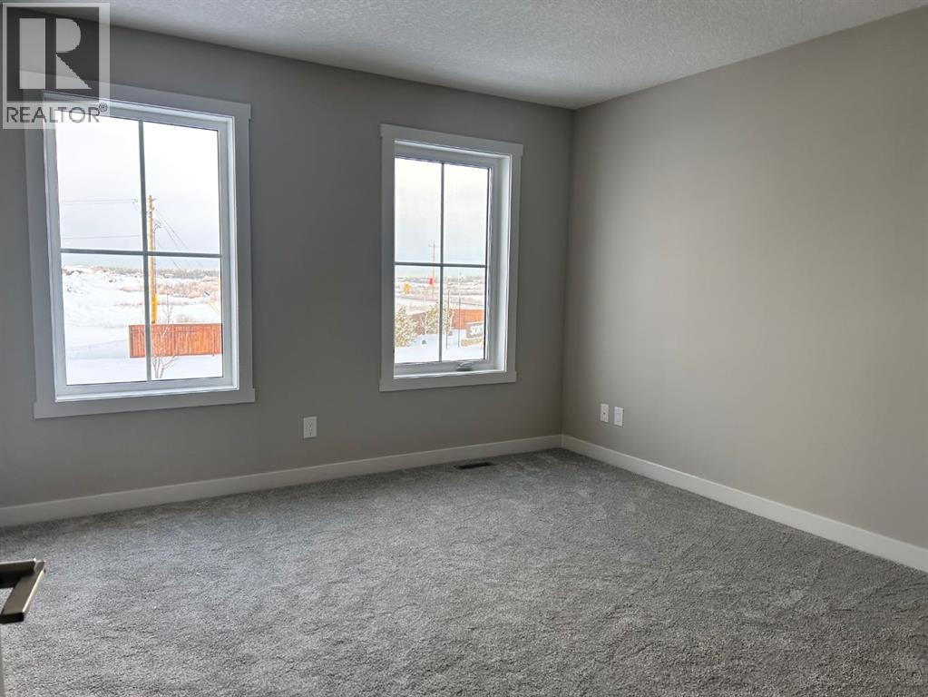 33 Sora Gate Se, Calgary, Alberta T3S 0A7 - Photo 6 - A2273033