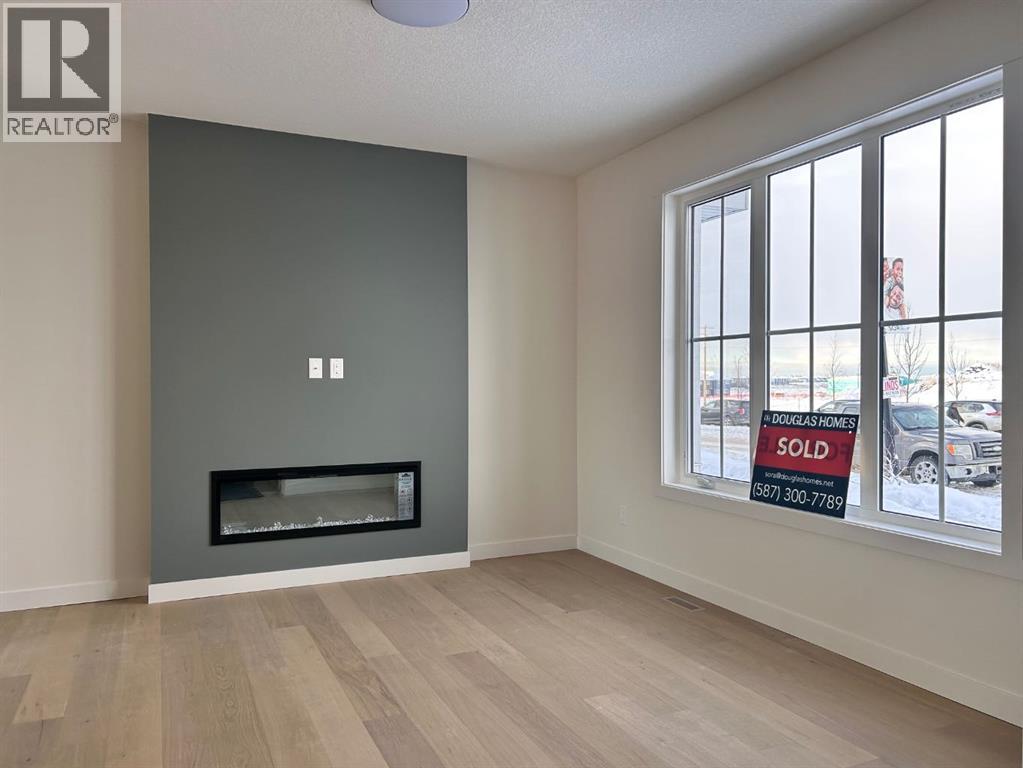 25 Sora Gate Se, Calgary, Alberta T3S 0A7 - Photo 1 - A2270547