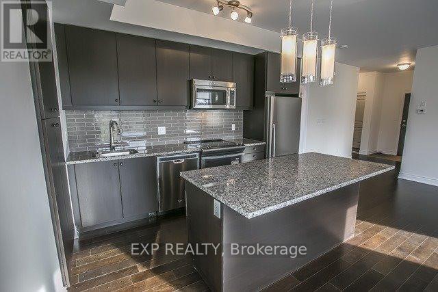 310 - 3170 Erin Mills Parkway, Mississauga, Ontario L5L 0B6 - Photo 5 - W12611808