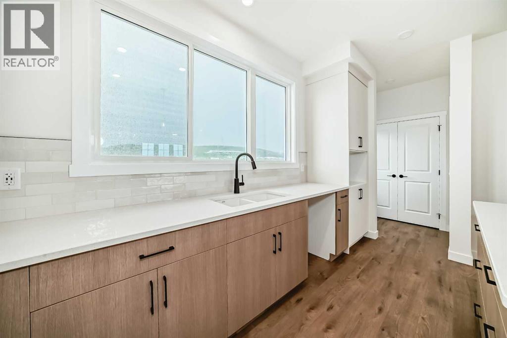 426 Heartland Way, Cochrane, Alberta  T4C 3E5 - Photo 9 - A2235464