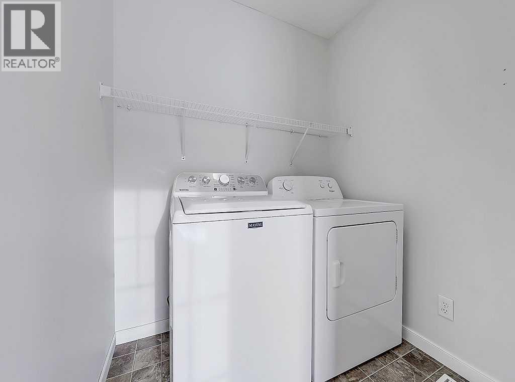 409 Cimarron Boulevard, Okotoks, Alberta  T1S 0A9 - Photo 13 - A2269381