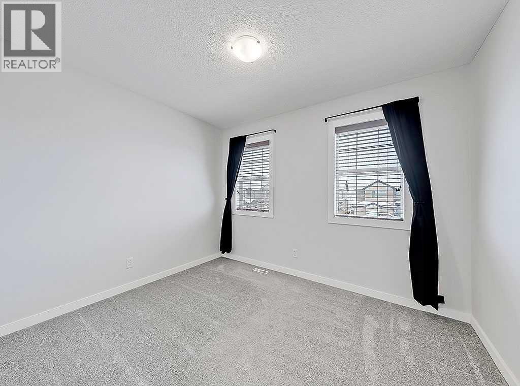 409 Cimarron Boulevard, Okotoks, Alberta  T1S 0A9 - Photo 26 - A2269381