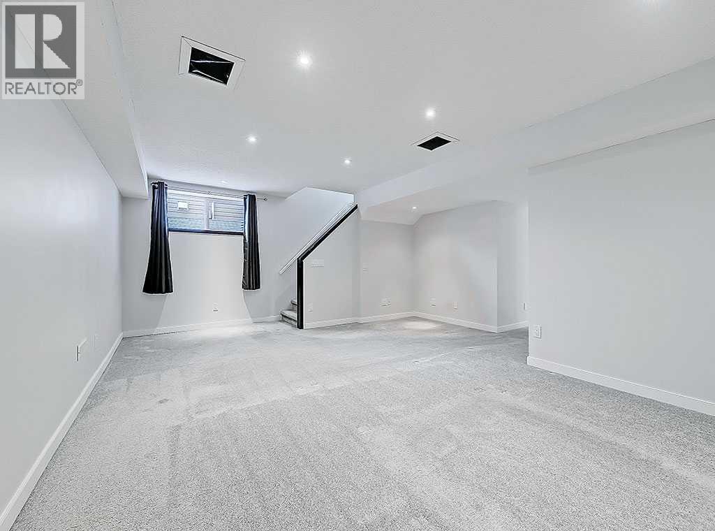 409 Cimarron Boulevard, Okotoks, Alberta  T1S 0A9 - Photo 29 - A2269381