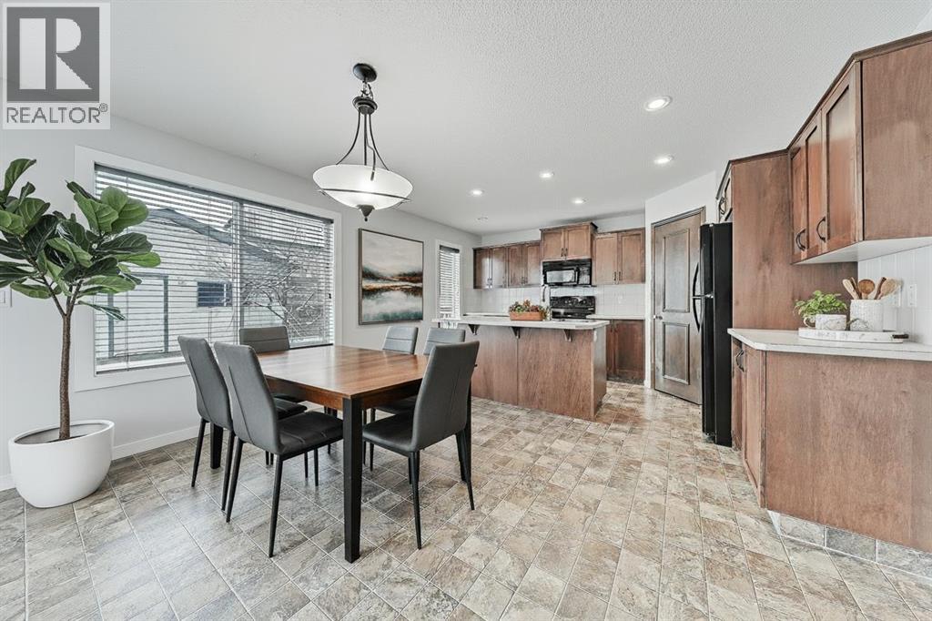 409 Cimarron Boulevard, Okotoks, Alberta  T1S 0A9 - Photo 9 - A2269381