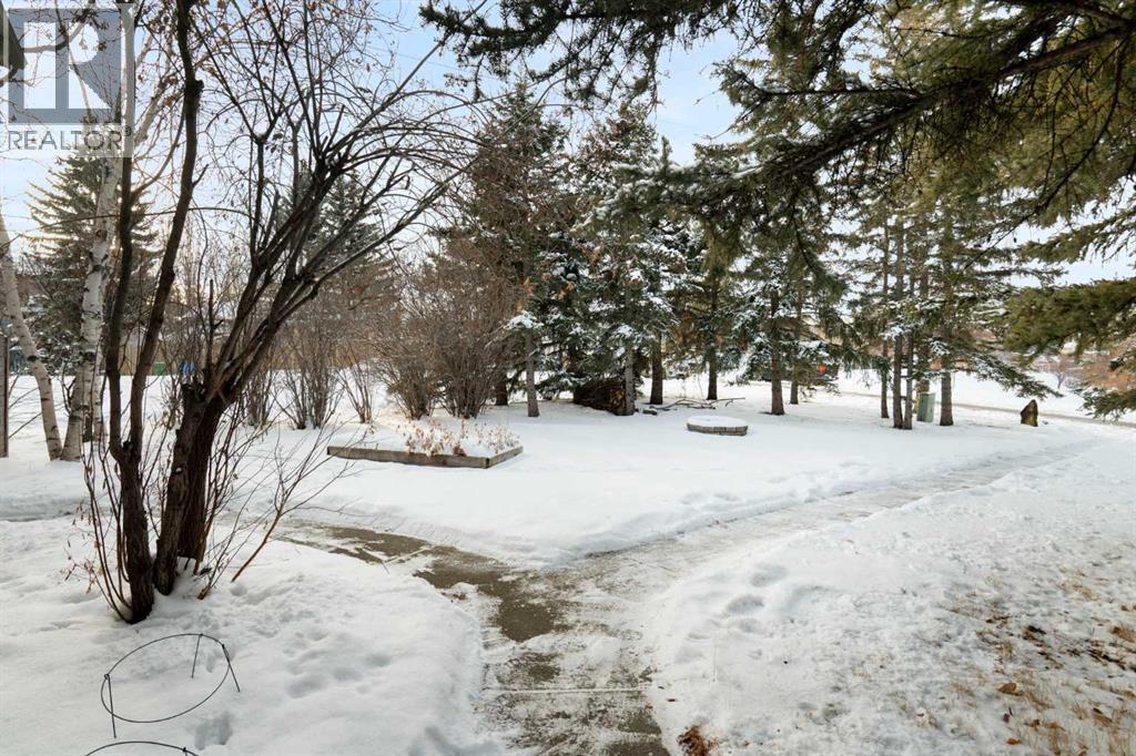 211 Coach Side Road Sw, Calgary, Alberta  T3H 1L6 - Photo 4 - A2273632