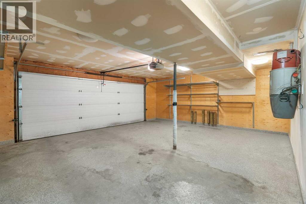 211 Coach Side Road Sw, Calgary, Alberta  T3H 1L6 - Photo 40 - A2273632