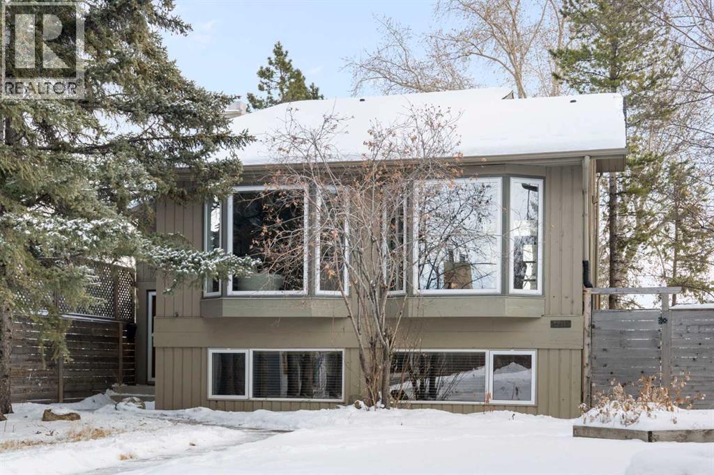211 Coach Side Road Sw, Calgary, Alberta  T3H 1L6 - Photo 1 - A2273632