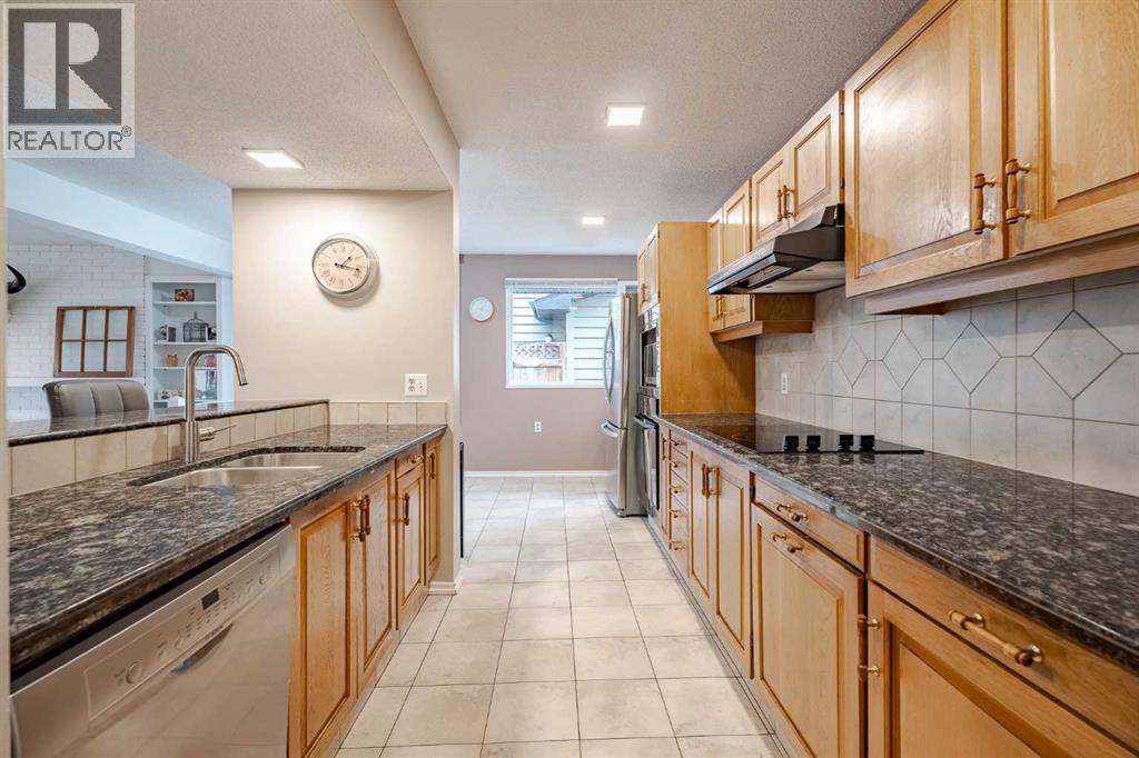 2427 Deer Side Drive, Calgary, Alberta  T2J 5L7 - Photo 12 - A2271544