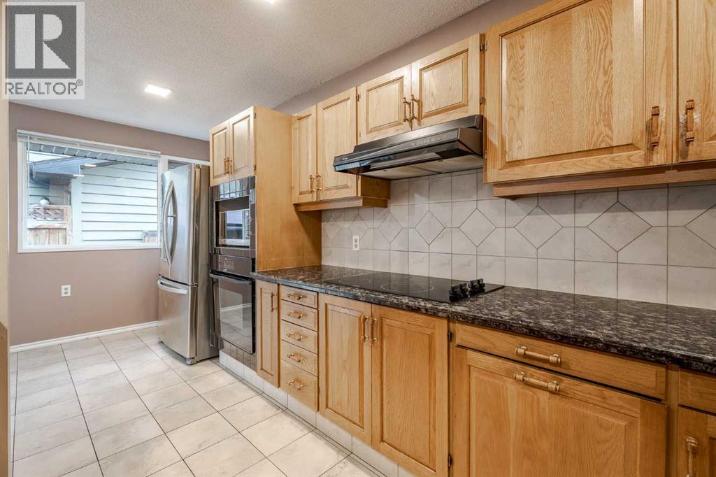 2427 Deer Side Drive, Calgary, Alberta  T2J 5L7 - Photo 13 - A2271544