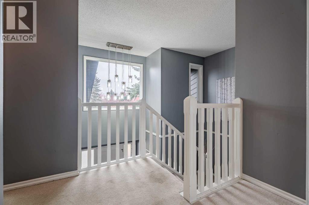 2427 Deer Side Drive, Calgary, Alberta  T2J 5L7 - Photo 19 - A2271544