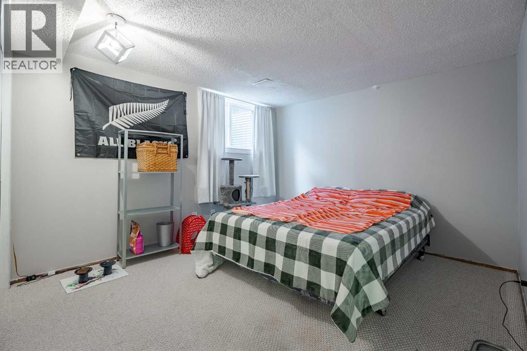 2427 Deer Side Drive, Calgary, Alberta  T2J 5L7 - Photo 34 - A2271544