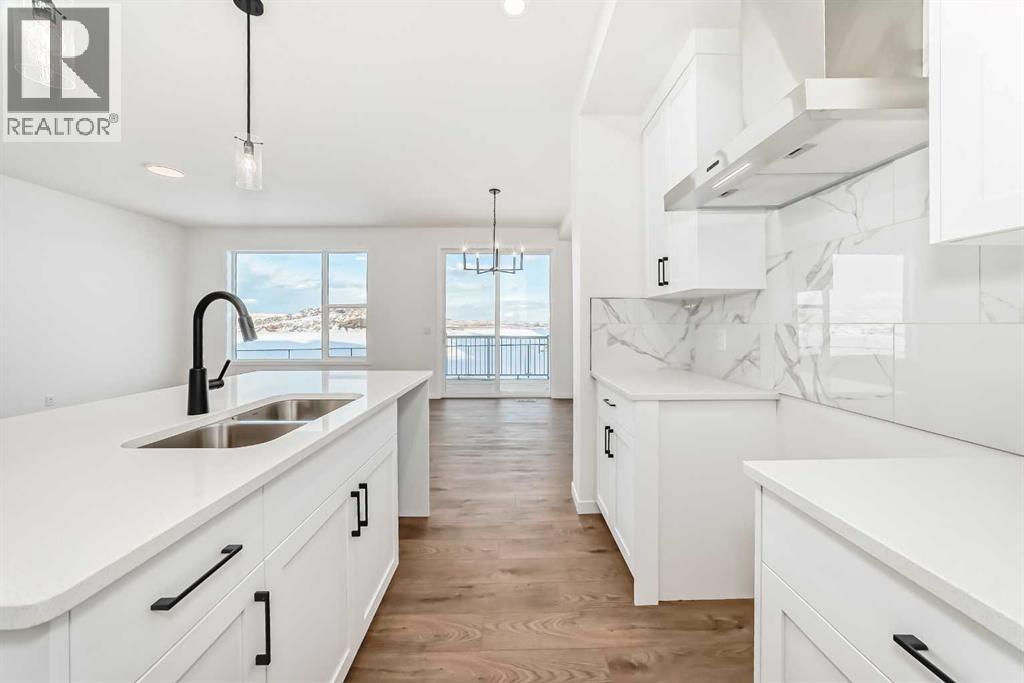 63 Southbow Village Way, Cochrane, Alberta  T4C 3J9 - Photo 7 - A2273096