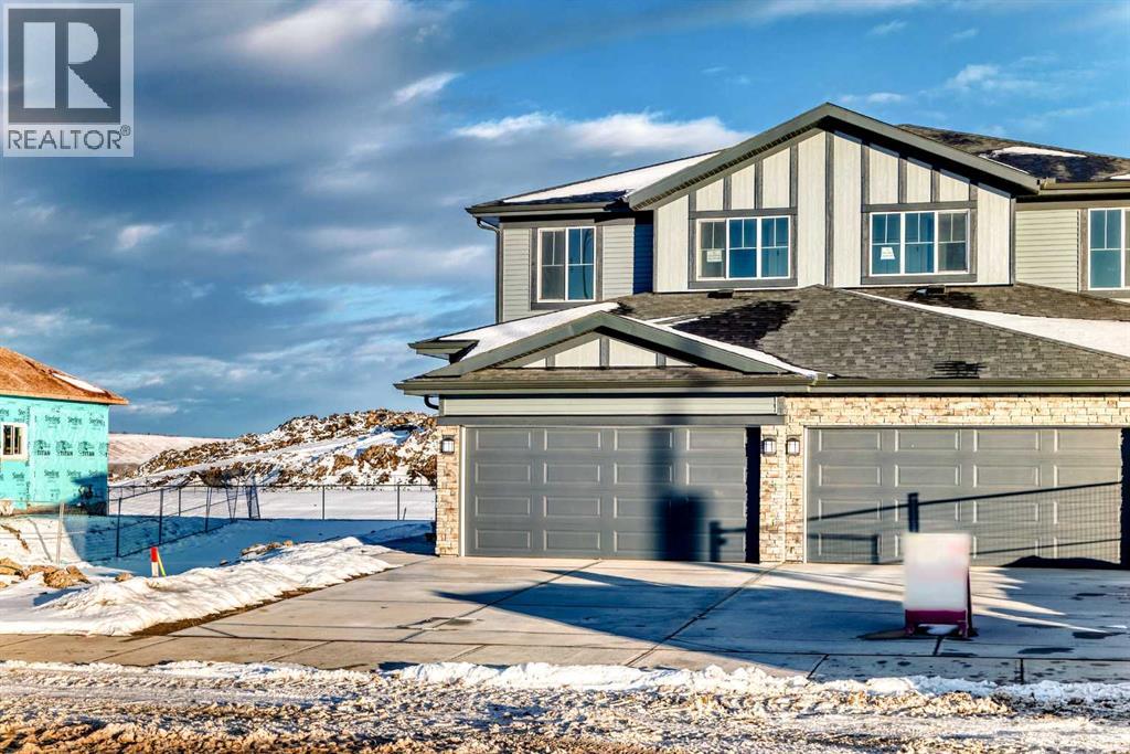 63 Southbow Village Way, Cochrane, Alberta  T4C 3J9 - Photo 2 - A2273096