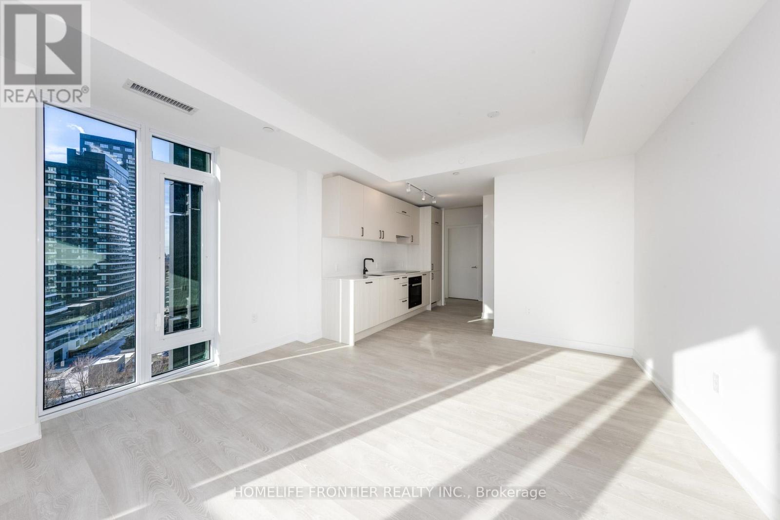 1414 - 1 Quarrington Lane, Toronto, Ontario  M3C 0S4 - Photo 3 - C12612492