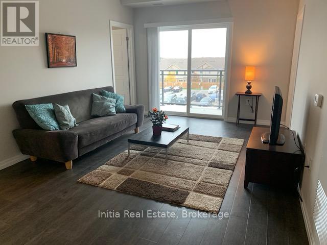 323 - 35 Kingsbury Square, Guelph (Pineridge/westminster Woods), Ontario  N1L 0J4 - Photo 2 - X12612412