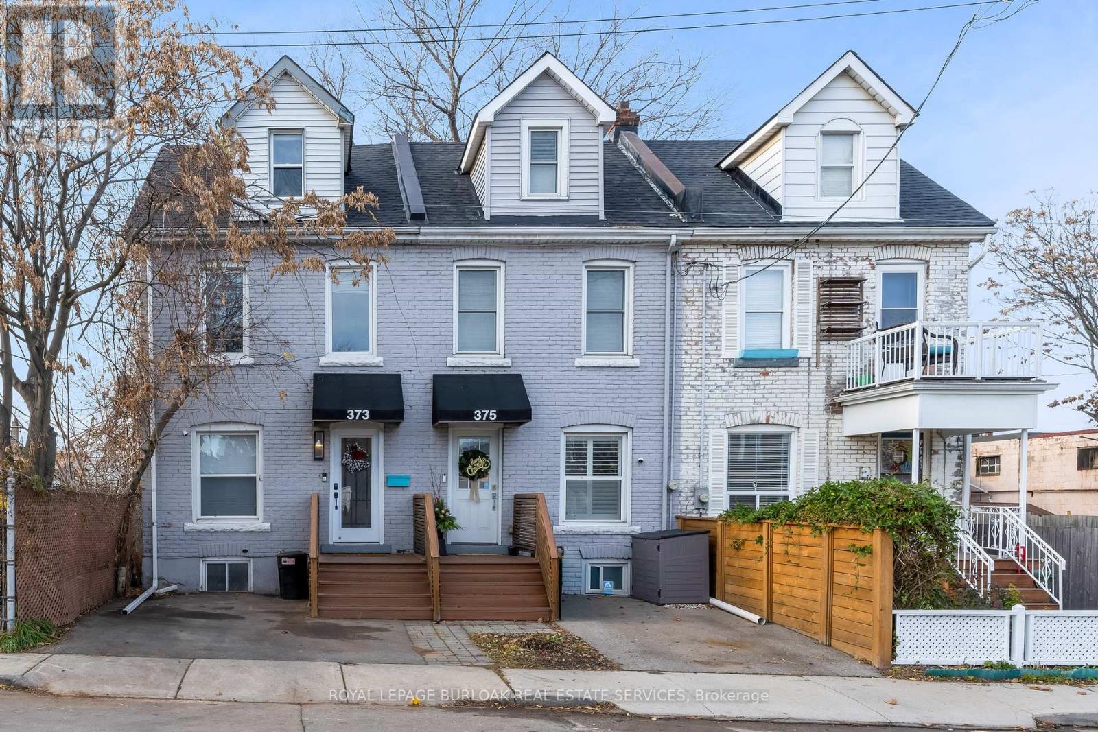 Welcome to the kind of home that makes you say "YES!" the moment you step inside! This beautifully updated 2.5-storey, solid-brick end-unit townhome is packed with charm, character & modern upgrades which is an irresistible opportunity for first-time buyers, investors or anyone craving a fresh start in a home that simply feels good the second you walk through the door! Fall in love with the bright, clean, fully renovated interior! A newer kitchen, updated bathroom & fresh hardwood flooring throughout creates a light, modern feel, while the tall ceilings & century-brick character add warmth & soul! No stress, no projects, just unpack & enjoy! With two bedrooms plus a spacious loft used as the primary suite, you have room to grow, create & make the home uniquely yours! Don't need all three sleeping spaces? The extra bedroom offers amazing flexibility by turning it into a dreamy office, a bright playroom, a cozy reading hideaway, or a creative studio! The choice is yours! The backyard is your own private retreat! Step outside to a fully fenced oasis! It is secluded, quiet & beautifully set up for relaxation, entertaining, morning coffee, weekend BBQs or quiet moments alone! And yes, there's a hot tub! Imagine unwinding here at the end of a long day, enjoying a peaceful soak under the stars! This yard gives you the space to breathe. With front driveway parking, convenience becomes part of your everyday routine. Whether you're entering the market, expanding your portfolio, or looking for a smart investment with strong rental potential, this home checks every box: updated, affordable, spacious, stylish &move-in ready! In a competitive price range, this one stands out and homes like this don't wait around! Located steps to Hamilton General Hospital, schools, parks, transit & daily amenities, you're set up for easy living in a neighbourhood that's growing fast & offering fantastic value. Come see why this home feels like "the one!" This is where your next chapter begins (id:48254)