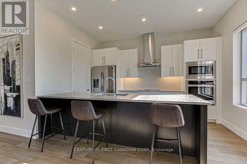 202 - 1696 Fiddlehead Place, London North, Ontario  N6G 5M6 - Photo 4 - X12612900