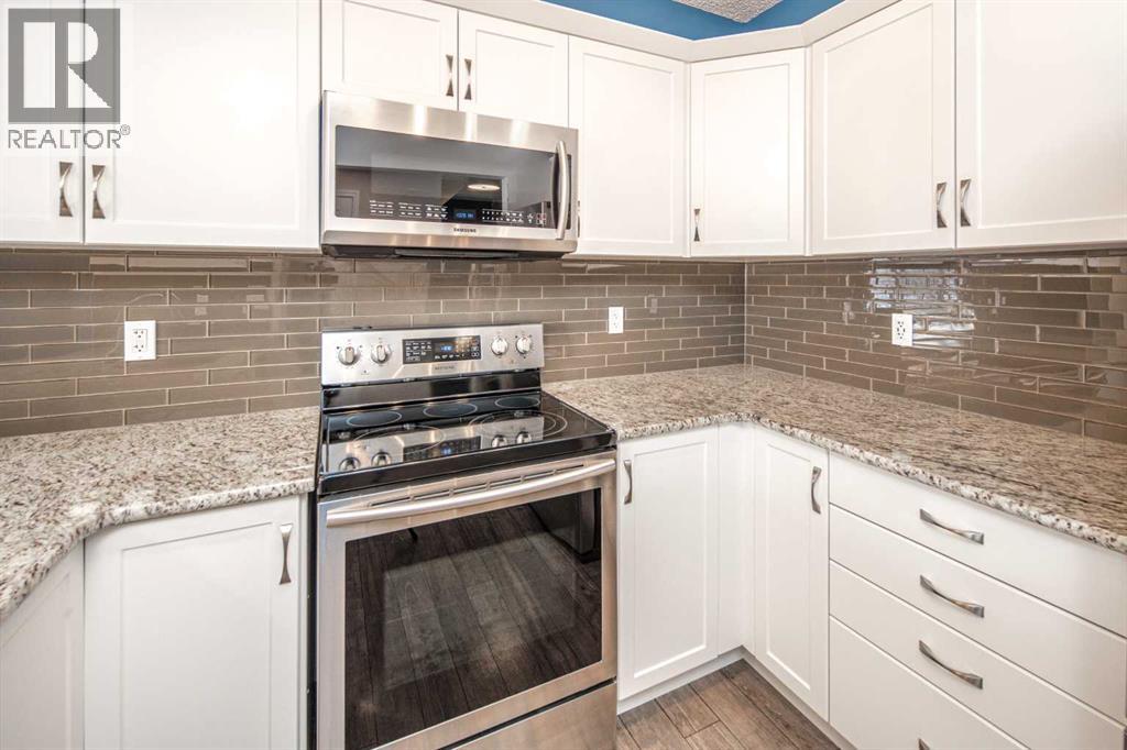 22 Windford Drive Sw, Airdrie, Alberta  T4B 3Z7 - Photo 8 - A2274289