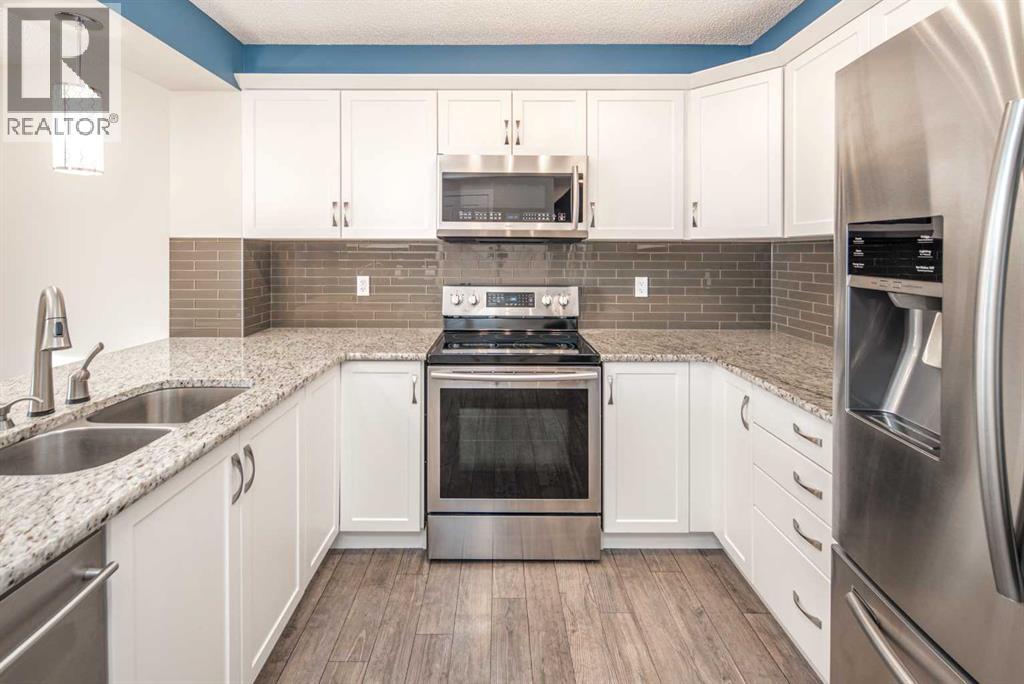 22 Windford Drive Sw, Airdrie, Alberta  T4B 3Z7 - Photo 7 - A2274289