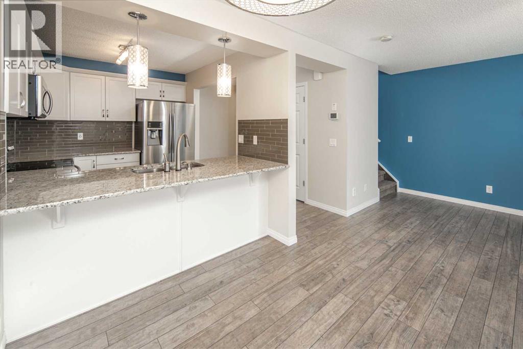 22 Windford Drive Sw, Airdrie, Alberta  T4B 3Z7 - Photo 4 - A2274289