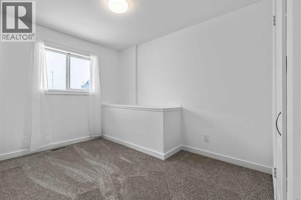 821 Railway Avenue, Cayley, Alberta  T0L 0P0 - Photo 19 - A2273177