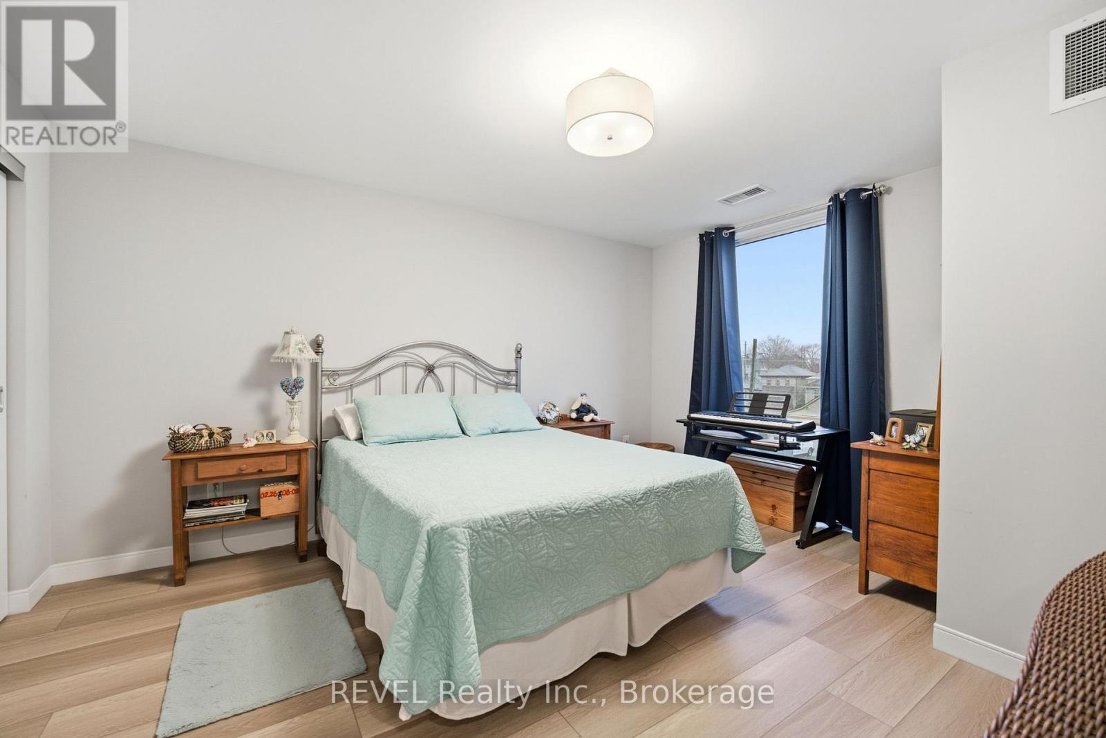 203 - 118 West Street, Port Colborne, Ontario  L3K 0B9 - Photo 14 - X12613356