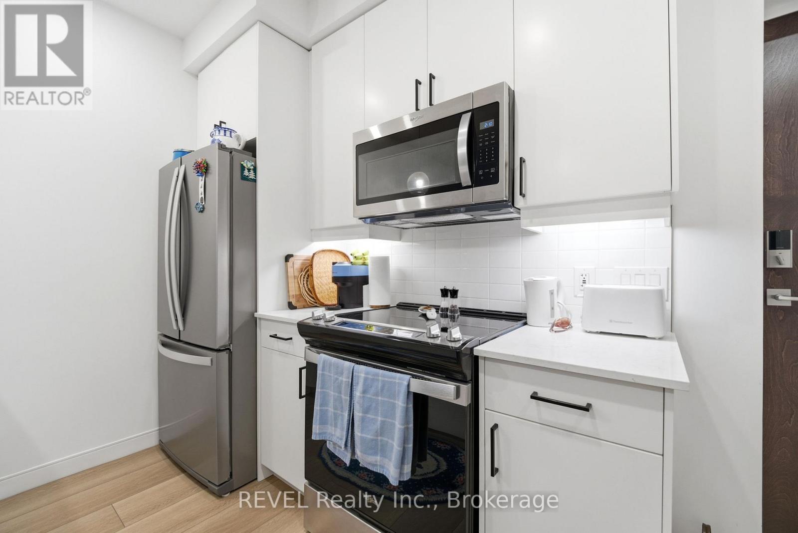 203 - 118 West Street, Port Colborne, Ontario  L3K 0B9 - Photo 7 - X12613356