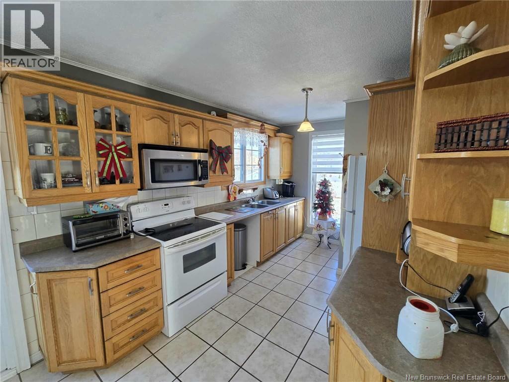 210 Francine, Beresford, New Brunswick E8K 1N8 - Photo 2 - NB131137