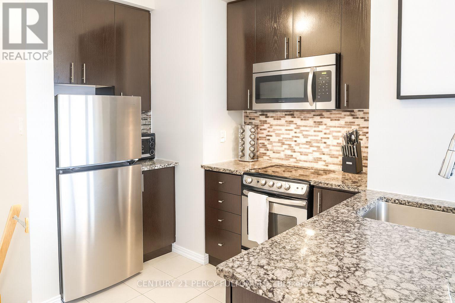 257 - 19 Coneflower Crescent, Toronto, Ontario  M2R 0A5 - Photo 2 - C12613608